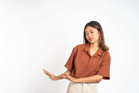 beautiful Young woman refusing with both palms gesture over isolated backgroundの写真素材
