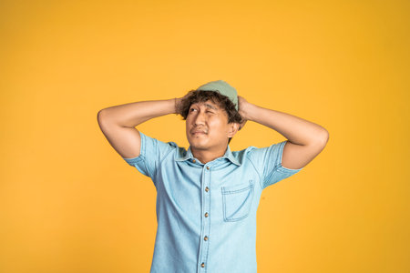 confused young muslim woman feeling uncertain about her life choice isolated on orange background