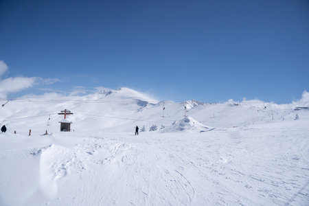 beautiful snowy moutain peak in sunny day