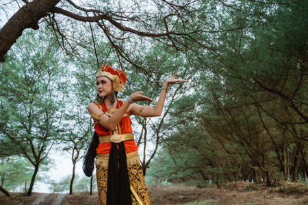 portrait young women presenting traditional Javanese dance movements