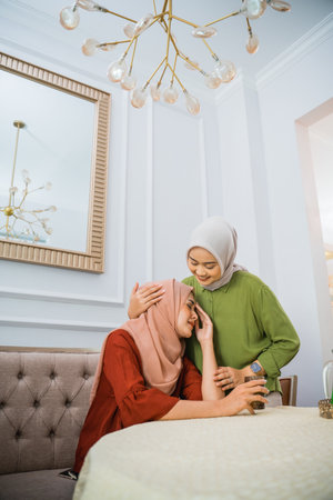 veiled Muslim woman has a sad veiled woman coming homeの写真素材