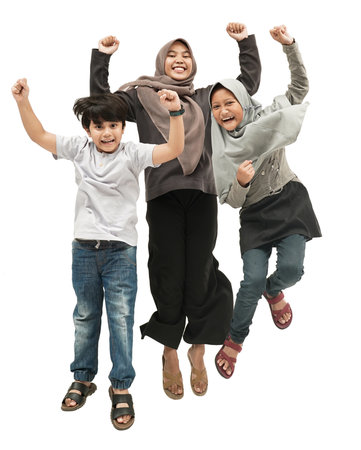 two young asian brother and sister sibling with mother over white backgroundの写真素材