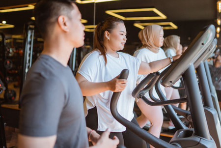 plus size woman doing exercise for weight loss program in gymnasium