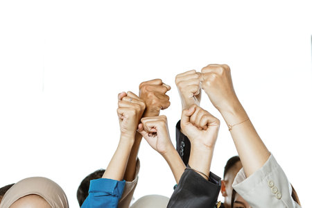 potrait of hands raised with fist gesture in isolated background
