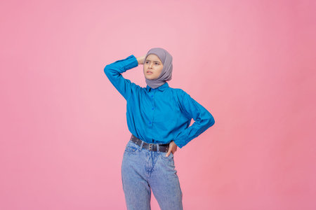 A fashionable woman is showcasing her unique style and confidence through vibrant colors
