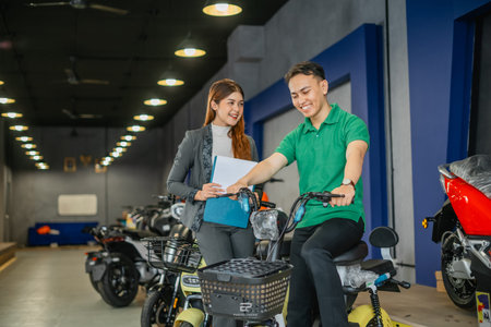 male customer testing electric bicycle product before buying