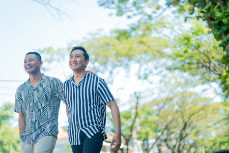 Two close friends happily enjoying a stroll in nature, embodying companionship and joy