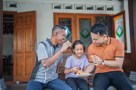good parenting father and grandfather caring for daughter