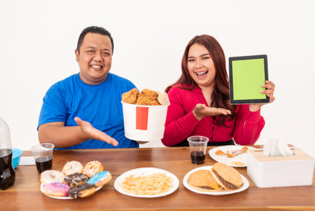 A group of friends happily enjoying a delightful feast together filled with smiles and tasty treats