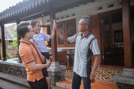 cute grandchild high five her asian grandfather, family concept