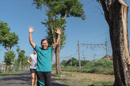 Active seniors exercising outside, showcasing health and vitality in their lives