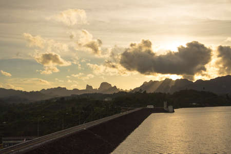 Beautiful sunset on Cheow Lan Dam (Ratchaprapa Dam) , Thailandの写真素材