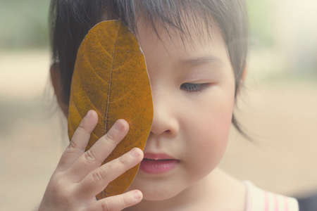 Asian girls playing on the garden .の写真素材