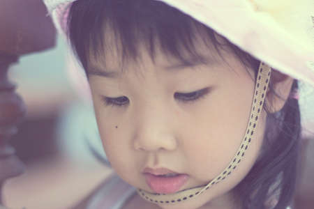 Asian girls playing on the garden .の写真素材