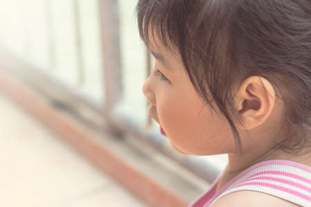 Asian girl playing on the garden.の写真素材