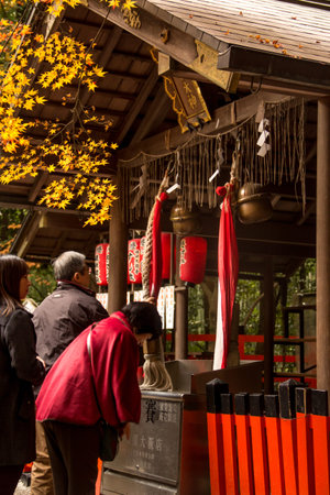 Japanese people make merit at the shrine in Kyoto , Japan. December 2015