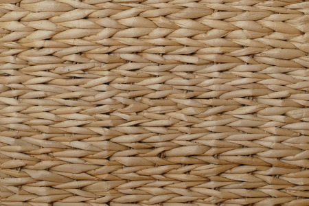 background wallpapper from woven banana leavesの写真素材