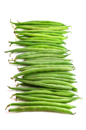 row of green beans, vertical format, isolated on white backgroundの写真素材