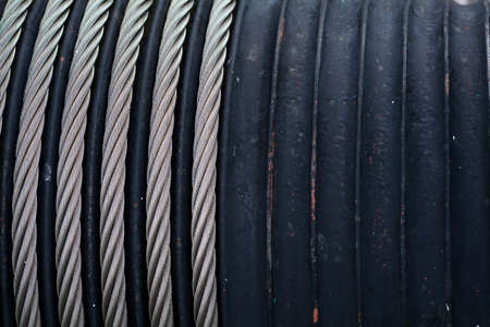 steel ropes wound on a shaft, abstract industrial background, detailの写真素材