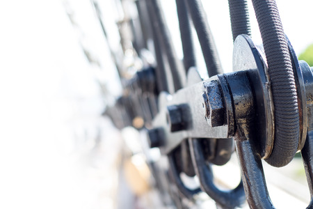 rigging detail on a sailing vessel, selected focus with narrow depth of field, background blurred to whiteの写真素材