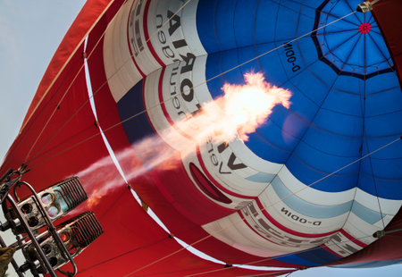 DEGTOW, GERMANY - SEPTEMBER 8, 2018:  flames are shooting into a hot air balloon for the launch at the balloon festival Boltenhagen at the Baltic Seaのeditorial素材
