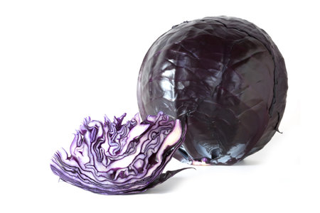 Purple cabbage whole and slice isolated on a whiteの写真素材