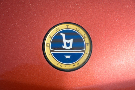 RATZEBURG, GERMANY - JUNE 2, 2019: Bertone torino logo emblem on a red metallic motor hood, classic automobile at the oldtimer car meeting in Ratzeburg, copy spaceのeditorial素材