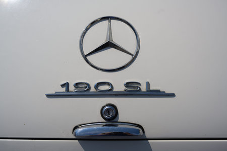 RATZEBURG, GERMANY - JUNE 2, 2019: mercedes 190 sl, chrome logo on the luxury roadster cabriolet, a...