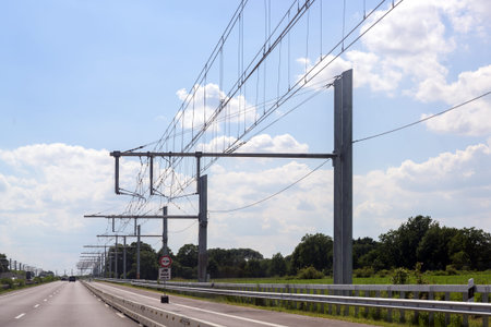Electric overhead contact wire for hybrid trucks on E-Highway, test track in Luebeck, Germany