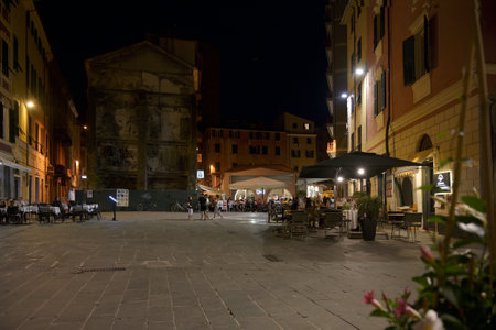 LA SPEZIA, ITALY, JULY 4, 2019: Piazza Sant Agostino at night with bars and street restaurants in the old town of La Spezia, Liguria, Italyのeditorial素材