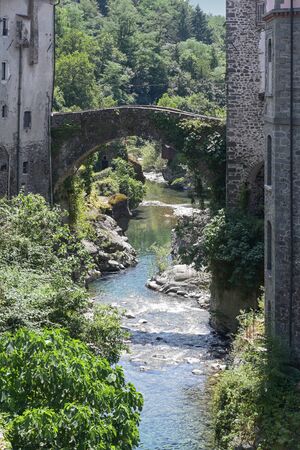 Magra River with the ancient bridge in Bagnone, a small town in Tuscany, Italyの写真素材