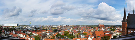 panorama cityscape of the old town of wismar, aerial high angle view from the shipyards at the...