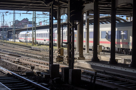 Hamburg, Germany, February 05, 2020: Older passenger train on a roofed track behind steel pillars in the main station of Hamburgのeditorial素材