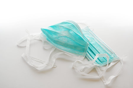 Medical face masks against infection with coronavirus  on white