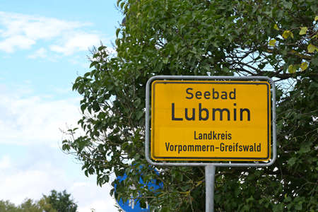 Place-name sign of the seaside resort Lubmin in the district of Vorpommern Greifswald at the Baltic sea, nearby is the landfall of the nord stream pipeline from Russia to Germany, copy spaceの写真素材
