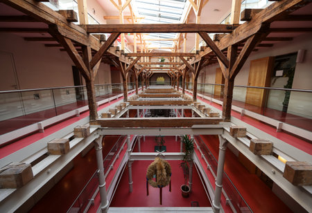 Grevesmuhlen, Germany, September 9, 2020: Inside the historic malt factory with steel and timber construction in open floors, industrial monument and district administrationのeditorial素材