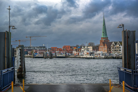 Lubeck Travemunde, Germany, January 15, 2023: Landing stage of the ferry across the river Trave from...