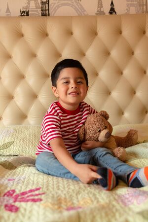 Hispanic mom with her 4 year old son playing and talkingの写真素材