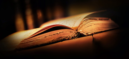 old book with open pagesの写真素材