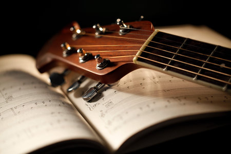 acoustic guitar with musical score