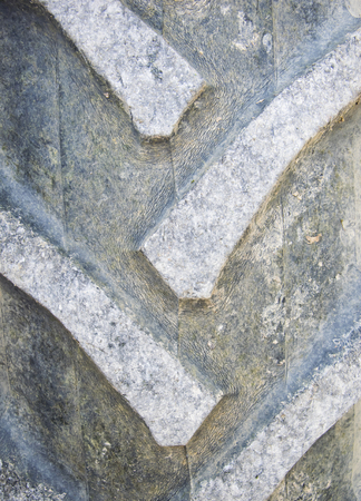 Detail up close of a tire tread from a tractor or other heavy duty construction machinery.の写真素材