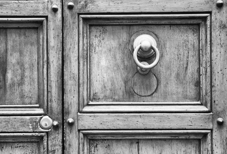 Details of an ancient Italian door in Florence, Italy (Black and White).の写真素材