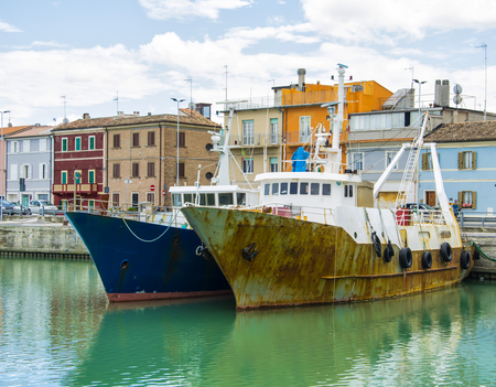 Liguria Italy - Old trawler fishing boats with fishing equipment docked in port - Lerici, La Spezia, Liguria, Italyのeditorial素材