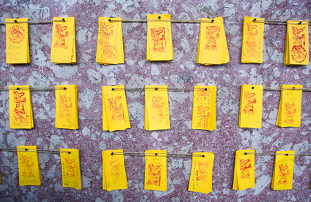 Kaohsiung, Taiwan - April 2016- Wall full of lucky charms.のeditorial素材