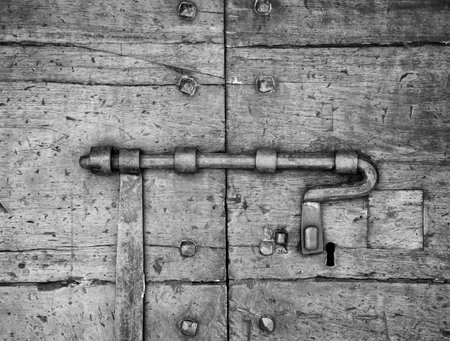 Details of an ancient Italian door in Florence, Italy (Black and White).の写真素材