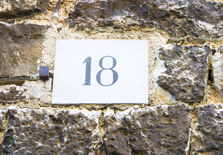 House number 18 sign.の写真素材