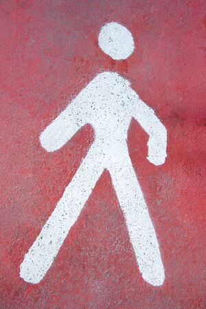Painted sign on asphalt for pedestrian laneの写真素材