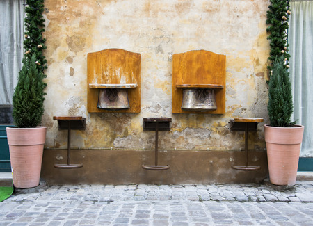 Vintage wooden bar stools outside Italianの写真素材