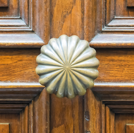 Details of an old wooden door in Florence, Tuscany, Italy.の写真素材