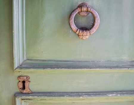 Details of an old wooden door in Florence, Tuscany, Italy.の写真素材